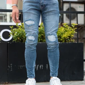 Jean bleu denim troué pour homme