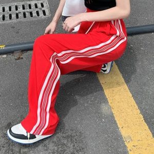 Red track pants