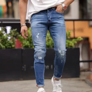 Jean slim fit bleu moyen avec détails destroy discrets – Homme