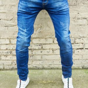 Jean bleu avec griffures homme